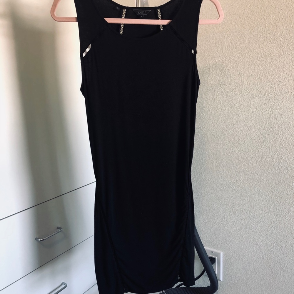 Guess bodycon dress that hugs body w eyelet detail